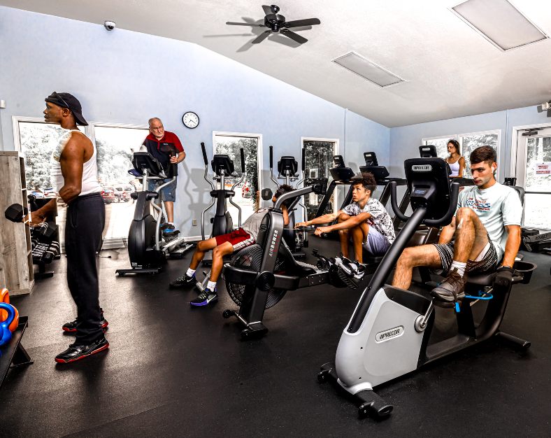 Fitness center with cardio equipment at Rumbling Bald Resort